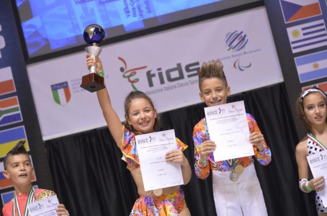 Ludovica e Carmine <br>campioni del mondo di danza