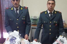 Scoperta dalla Finanza fabbrica del falso di storici marchi: due i denunciati